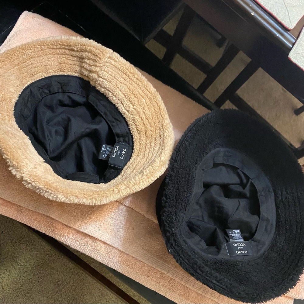 Two plush hats made by David and Young 100% polyester and faux fur. 7 inches